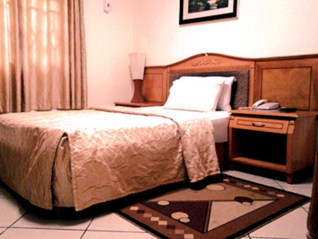 Sunset Hotel Кумасі Номер фото