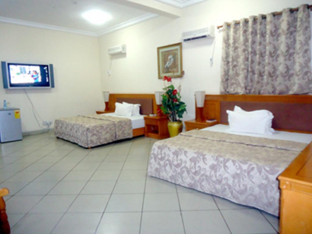 Sunset Hotel Кумасі Номер фото
